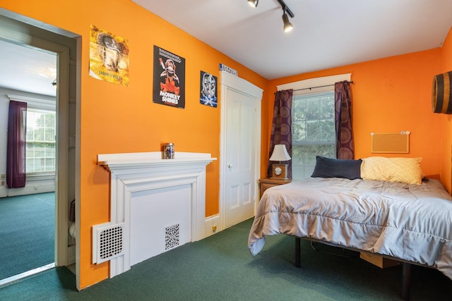 20 Winter St, Augusta, ME 04330 - carpeted bedroom featuring multiple windows and track lighting