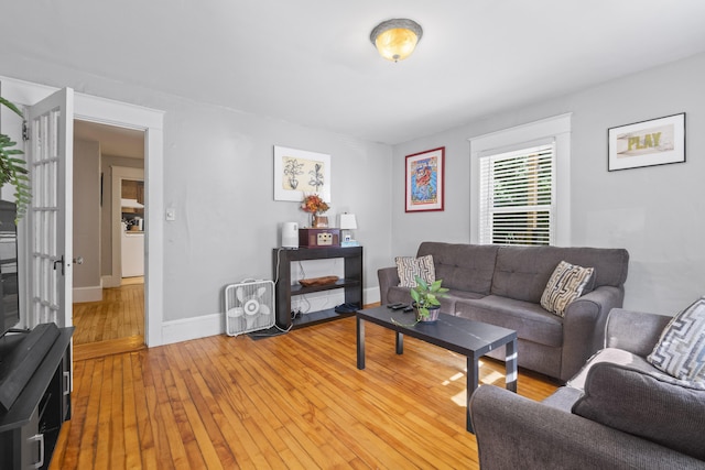 68 Newbury St, Auburn, ME 04210 - living room with light wood-type flooring and baseboards