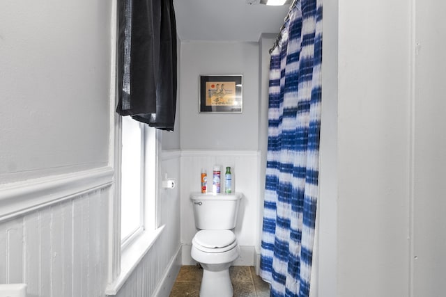 68 Newbury St, Auburn, ME 04210 - full bath featuring wainscoting, tile patterned flooring, and curtained shower