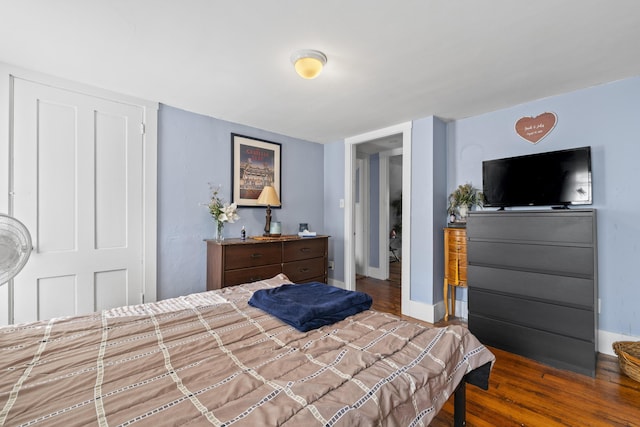 68 Newbury St, Auburn, ME 04210 - bedroom featuring wood finished floors and baseboards