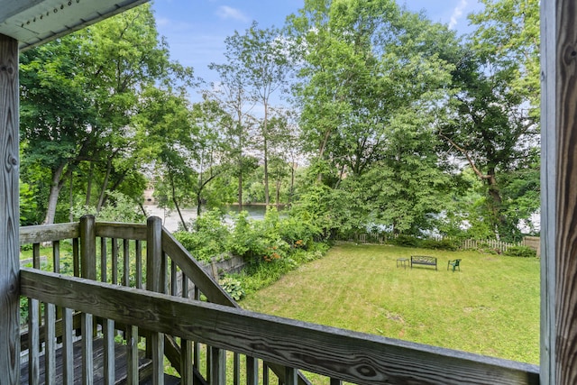 68 Newbury St, Auburn, ME 04210 - fenced backyard featuring view of scattered trees and a water view