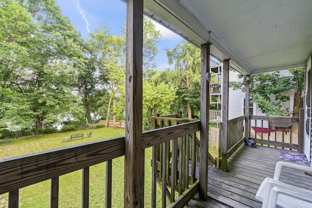 68 Newbury St, Auburn, ME 04210 - deck featuring a lawn and view of scattered trees