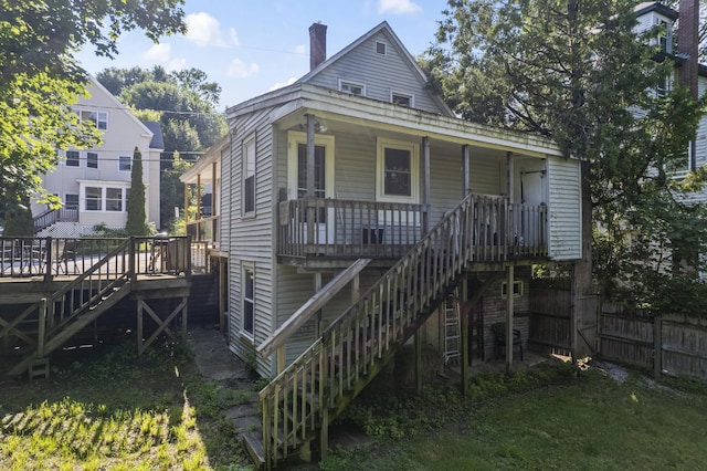 68 Newbury St, Auburn, ME 04210 - view of front of property featuring stairs, a porch, and a chimney