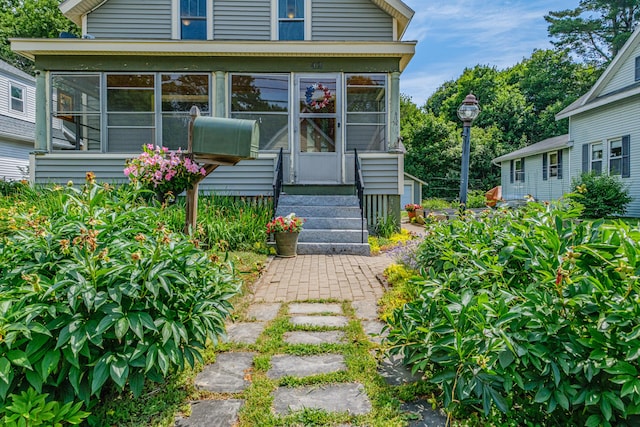 42 Sargent St, Westbrook, ME 04092 - view of front of home featuring a sunroom