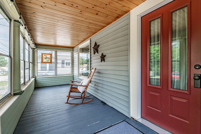 42 Sargent St, Westbrook, ME 04092 - sunroom featuring healthy amount of natural light, wood ceiling, and wooden walls