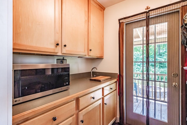 42 Sargent St, Westbrook, ME 04092 - kitchen featuring stainless steel microwave and light brown cabinetry