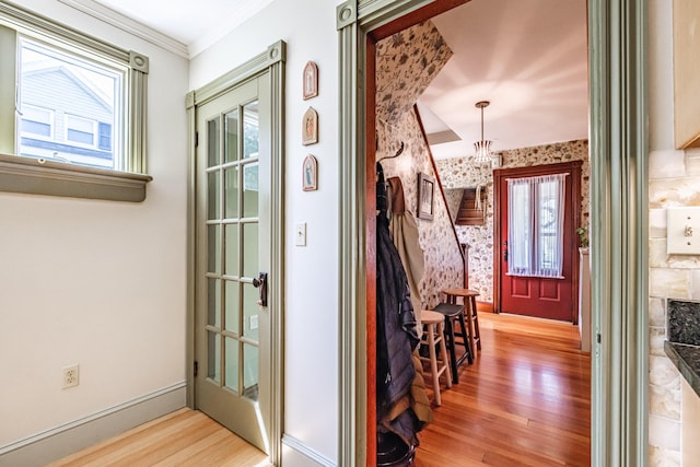 42 Sargent St, Westbrook, ME 04092 - entrance foyer featuring wood finished floors and crown molding