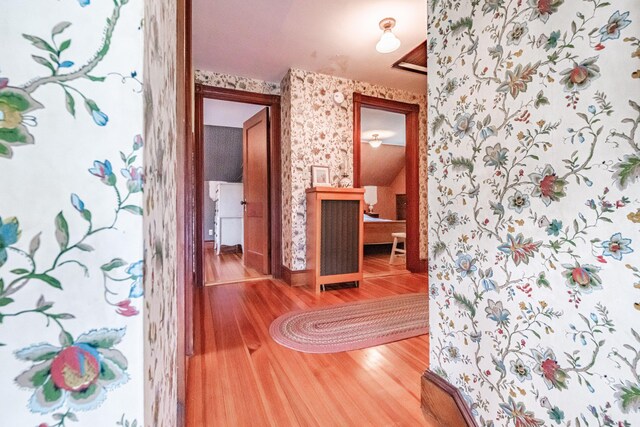42 Sargent St, Westbrook, ME 04092 - corridor featuring wallpapered walls and wood finished floors