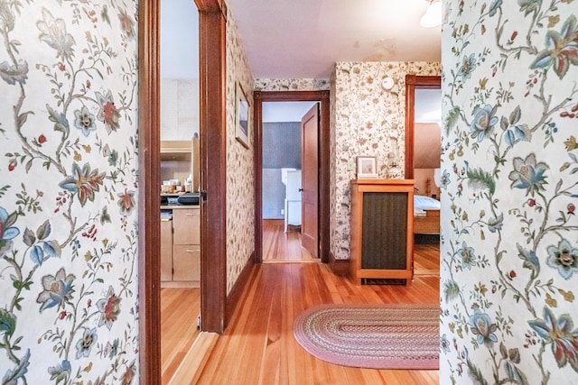 42 Sargent St, Westbrook, ME 04092 - bathroom featuring wallpapered walls and wood finished floors