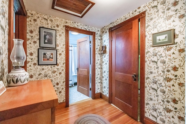 42 Sargent St, Westbrook, ME 04092 - foyer entrance featuring light wood-type flooring and wallpapered walls