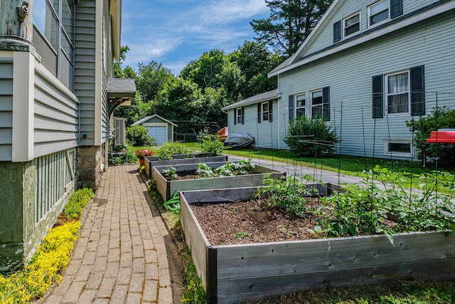 42 Sargent St, Westbrook, ME 04092 - view of yard with a garden and an outbuilding