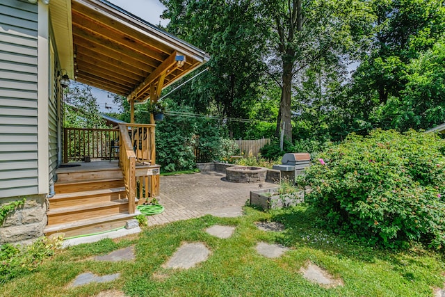 42 Sargent St, Westbrook, ME 04092 - view of yard featuring an outdoor fire pit and a patio area