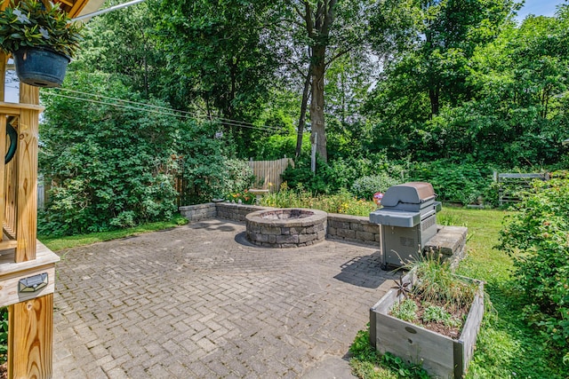 42 Sargent St, Westbrook, ME 04092 - view of patio with a fire pit and a grill