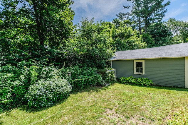 42 Sargent St, Westbrook, ME 04092 - view of green lawn featuring an outbuilding