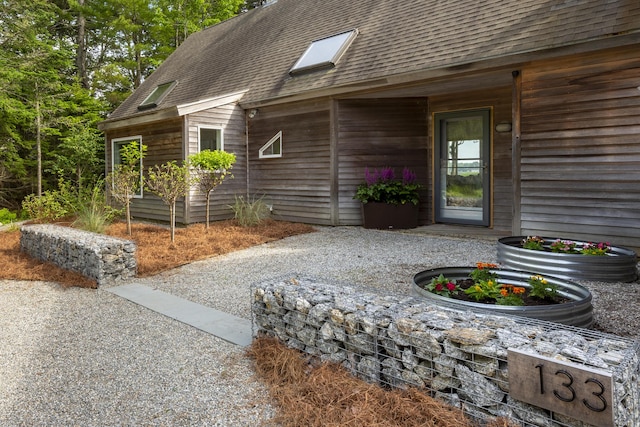 133 Scraggle Point Rd, Saint George, ME 04859 - property entrance featuring a shingled roof