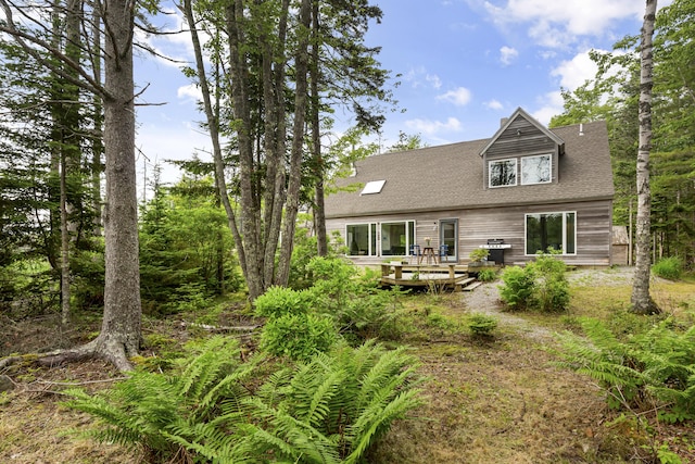 133 Scraggle Point Rd, Saint George, ME 04859 - rear view of house featuring a deck and roof with shingles