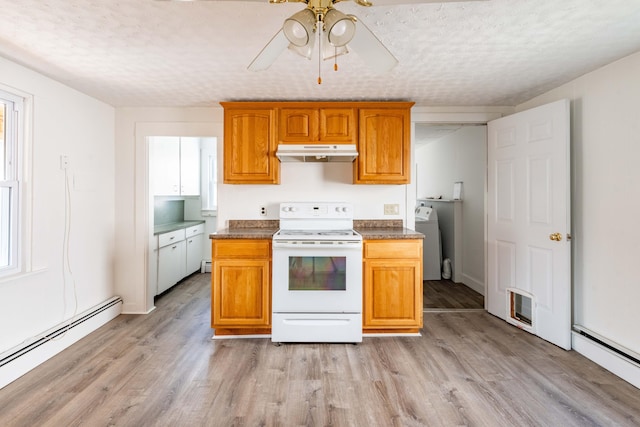 19 Fall St, Biddeford, ME 04005 - kitchen with electric stove, under cabinet range hood, a baseboard radiator, washer / clothes dryer, and a ceiling fan