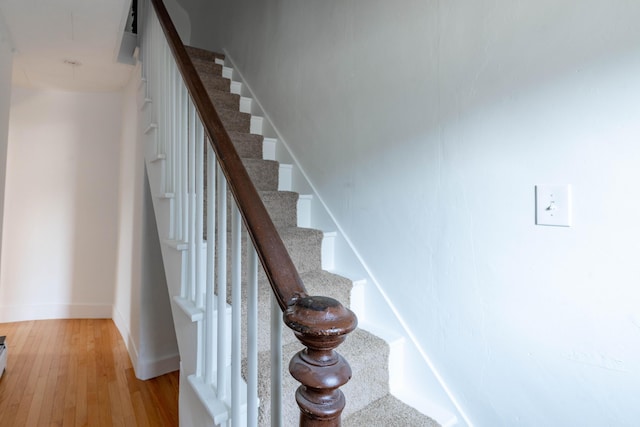 19 Fall St, Biddeford, ME 04005 - stairway featuring hardwood / wood-style floors and baseboards