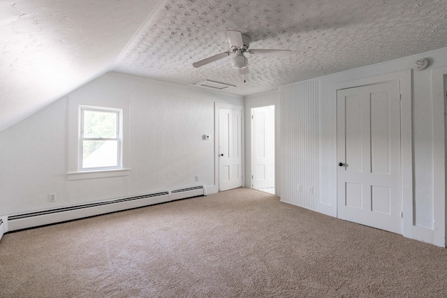 19 Fall St, Biddeford, ME 04005 - additional living space featuring a baseboard radiator, carpet flooring, vaulted ceiling, and a ceiling fan