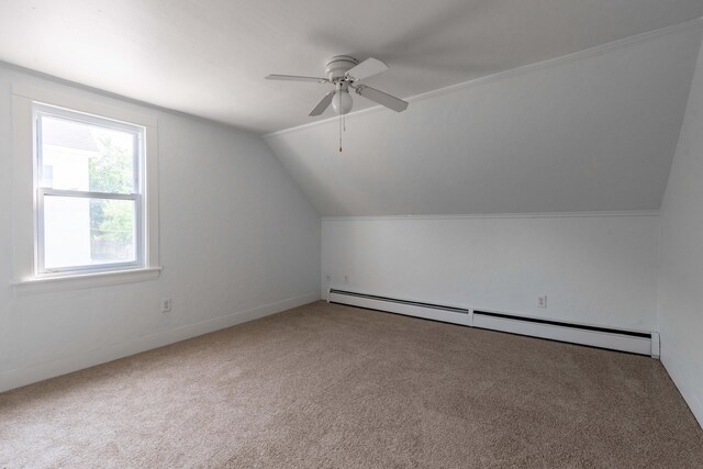 19 Fall St, Biddeford, ME 04005 - additional living space featuring baseboard heating, carpet flooring, vaulted ceiling, and a ceiling fan