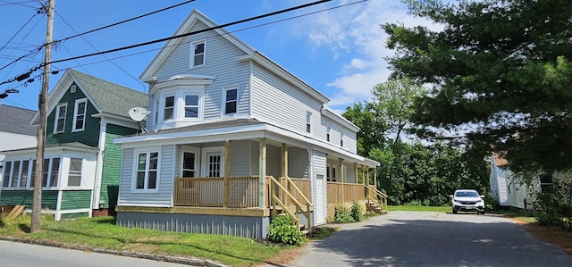 158 Water St, Waterville, ME 04901 - view of front of property with a porch and asphalt driveway