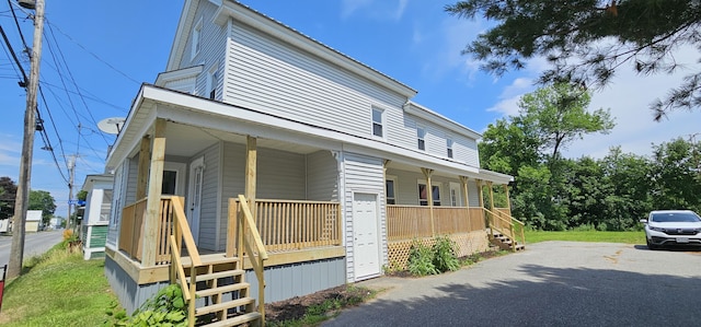 158 Water St, Waterville, ME 04901 - view of front of home featuring covered porch and stairway