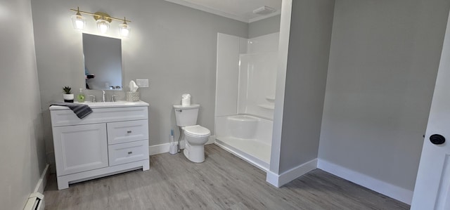 158 Water St, Waterville, ME 04901 - full bath with vanity, wood finished floors, ornamental molding, a shower, and a baseboard radiator