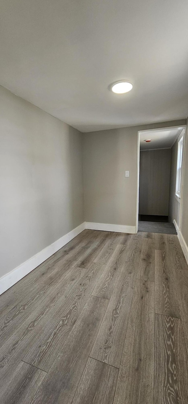 158 Water St, Waterville, ME 04901 - unfurnished room with wood finished floors and baseboards