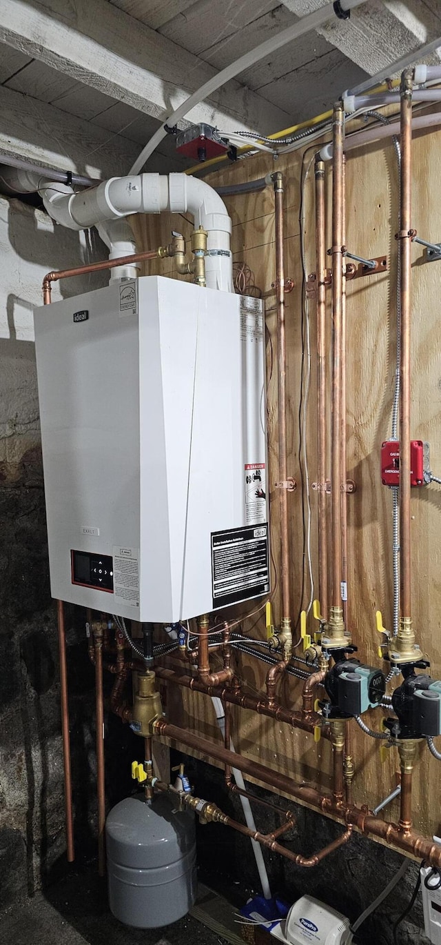158 Water St, Waterville, ME 04901 - utility room with water heater