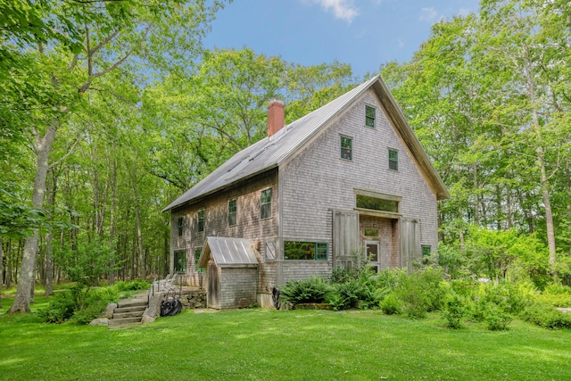 372 Bald Head Rd, Arrowsic, ME 04530 - view of front of home featuring a chimney and a front yard
