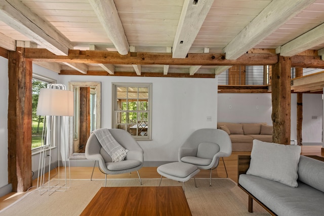 372 Bald Head Rd, Arrowsic, ME 04530 - sitting room featuring healthy amount of natural light, wood finished floors, and a wood ceiling with exposed beams