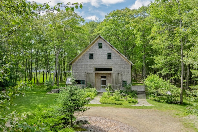 372 Bald Head Rd, Arrowsic, ME 04530 - a-frame style home featuring dirt driveway