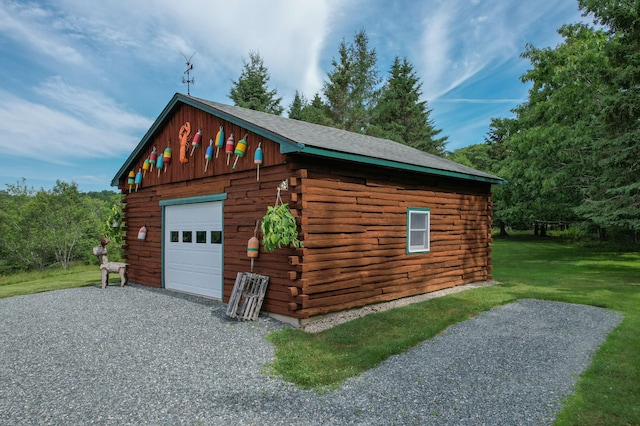 15 Tranquility Way, Ellsworth, ME 04605 - detached garage featuring gravel driveway