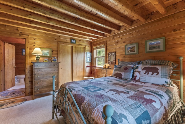 15 Tranquility Way, Ellsworth, ME 04605 - carpeted bedroom featuring a wood ceiling with exposed beams and wood walls