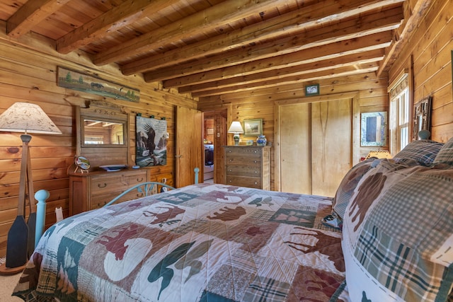 15 Tranquility Way, Ellsworth, ME 04605 - carpeted bedroom featuring wooden walls and a wooden ceiling with exposed beams