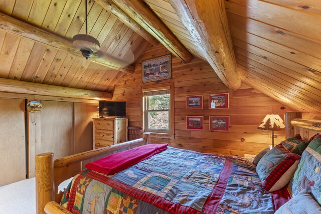 15 Tranquility Way, Ellsworth, ME 04605 - bedroom with wood walls, wooden ceiling, and carpet floors