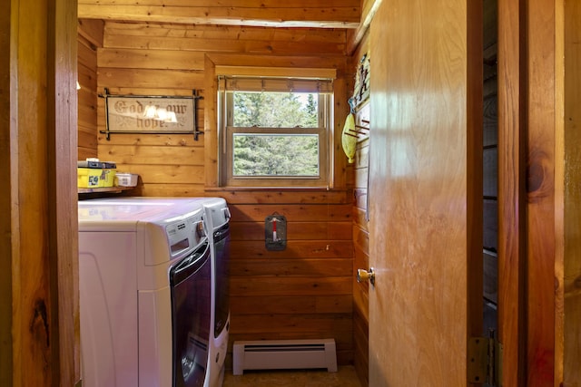 15 Tranquility Way, Ellsworth, ME 04605 - washroom with baseboard heating, independent washer and dryer, and wooden walls