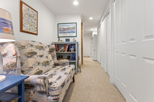 15 Tranquility Way, Ellsworth, ME 04605 - sitting room with light colored carpet and recessed lighting