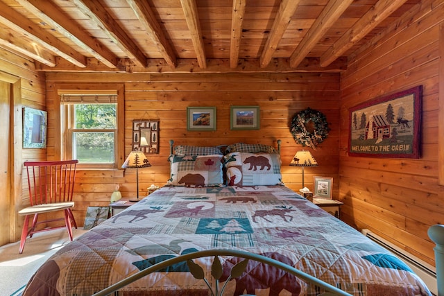 15 Tranquility Way, Ellsworth, ME 04605 - bedroom featuring a wood ceiling with exposed beams, a baseboard radiator, wooden walls, and carpet flooring