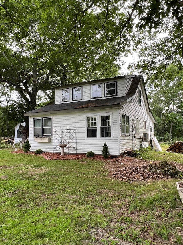 20 Coles Corner Rd, Winterport, ME 04496 - view of front facade featuring a front yard