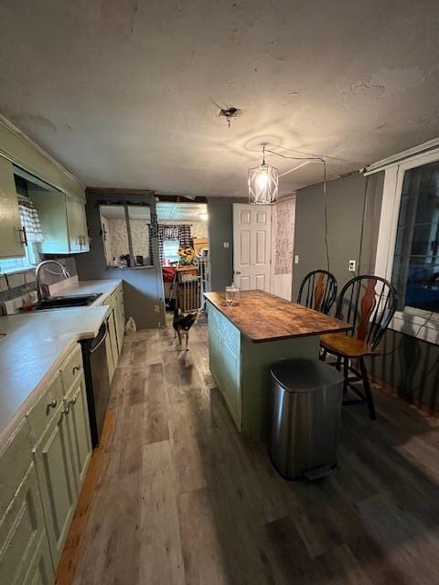 20 Coles Corner Rd, Winterport, ME 04496 - kitchen featuring wood finished floors, wooden counters, a center island, and dishwasher
