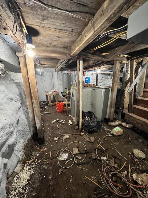 20 Coles Corner Rd, Winterport, ME 04496 - unfinished below grade area with stairs and gas water heater