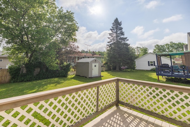 2 Tucker St, Lewiston, ME 04240 - deck with a storage shed and a yard