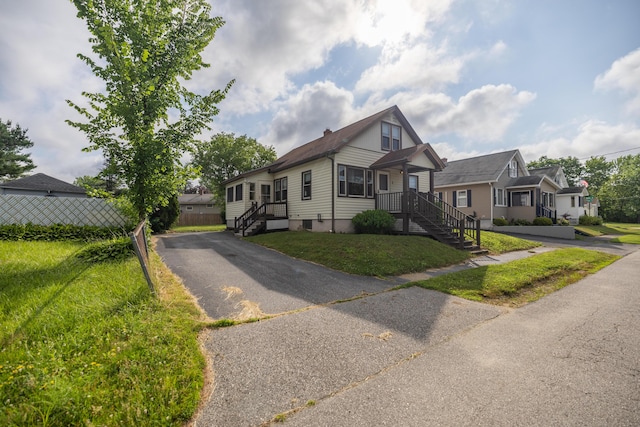 2 Tucker St, Lewiston, ME 04240 - view of property featuring asphalt driveway