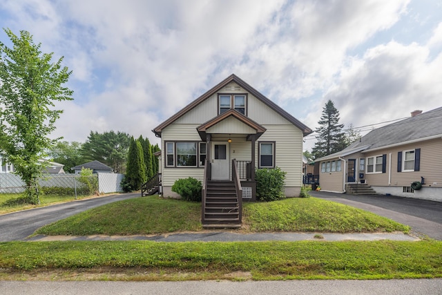 2 Tucker St, Lewiston, ME 04240 - bungalow-style home with asphalt driveway