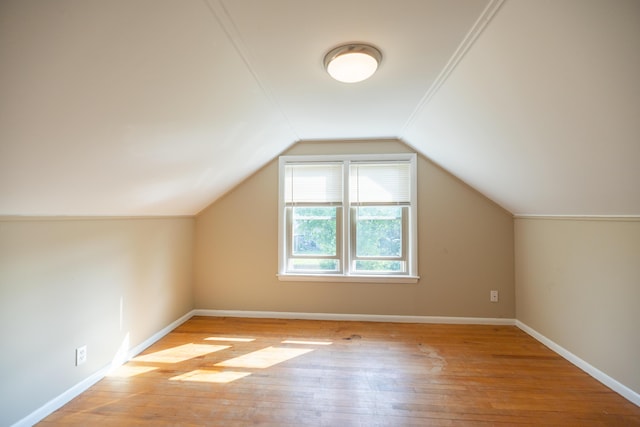 2 Tucker St, Lewiston, ME 04240 - additional living space with hardwood / wood-style flooring and lofted ceiling