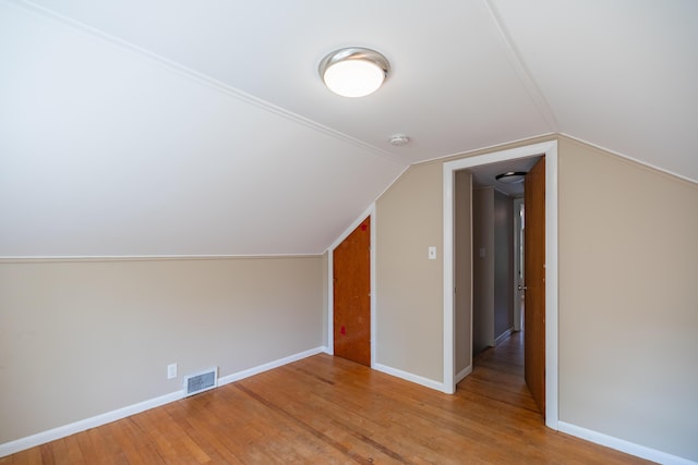 2 Tucker St, Lewiston, ME 04240 - bonus room with wood finished floors and vaulted ceiling