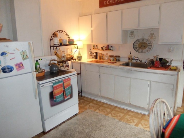 175 Alfred St, Biddeford, ME 04005 - kitchen featuring white appliances, white cabinets, and light countertops