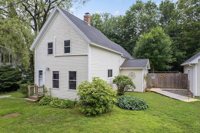 23 Cottage Dr, Friendship, ME 04547 - view of side of property with a chimney and roof with shingles