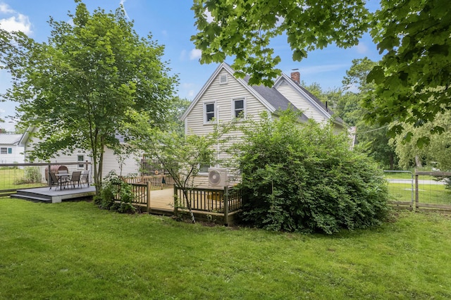 23 Cottage Dr, Friendship, ME 04547 - rear view of house with a chimney and a wooden deck